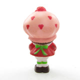 Strawberry Shortcake miniature figurine with three berries in apron