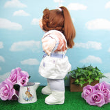 Cabbage Patch Kids Cornsilk doll with red hair in ponytail, curls around face