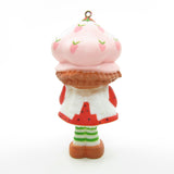 Strawberry Shortcake with a Christmas gift present ornament