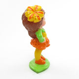 Side view of vintage Avon Scamper Lily Little Blossom doll