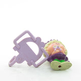 Charmkins Mollyberry charm doll with purple shoelace hanger