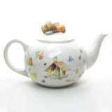 Marjolein Bastin Hallmark teapot with birdhouse and gardening motifs