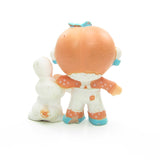 Apricot with Hopsalot Strawberry Shortcake miniature figurine with chip out of back of foot