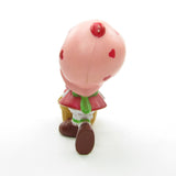 Strawberry Shortcake with a bushel basket miniature figurine
