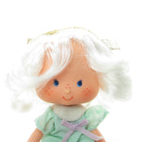 Angel Cake Strawberry Shortcake doll with white hair and blue eyes