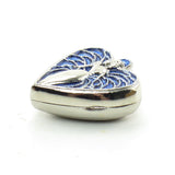 Silver heart-shaped locket photo holder ornament with blue angel