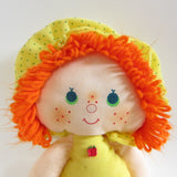 Apple Dumplin rag doll with orange yarn hair