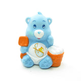 Baby Tugs Bear ready to shovel some clouds Care Bears miniature figurine