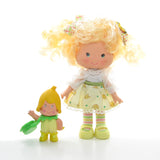 Strawberry Shortcake Berrykin Banana Twirl doll and Banana Berrykin critter