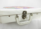 Torn vinyl Barbie doll carry case