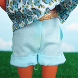Animal Lovin' Ken doll with stain on shorts