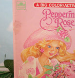 Peppermint Rose coloring book with stain on front cover