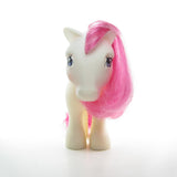 Birthflower pony with white body, pink hair, purple eyes
