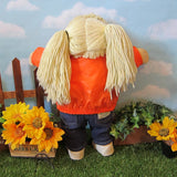 Vintage Cabbage Patch Kids girl doll with blonde pigtails