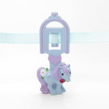 Blue Belle My Little Pony bookmark on light blue choker necklace