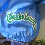 Cabbage Patch Kids logo on blue doll windbreaker jacket