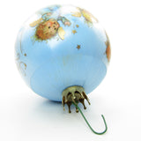 Blue satin ornament with discoloration