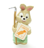 Easter bunny rabbit ornament with hoe and seeds