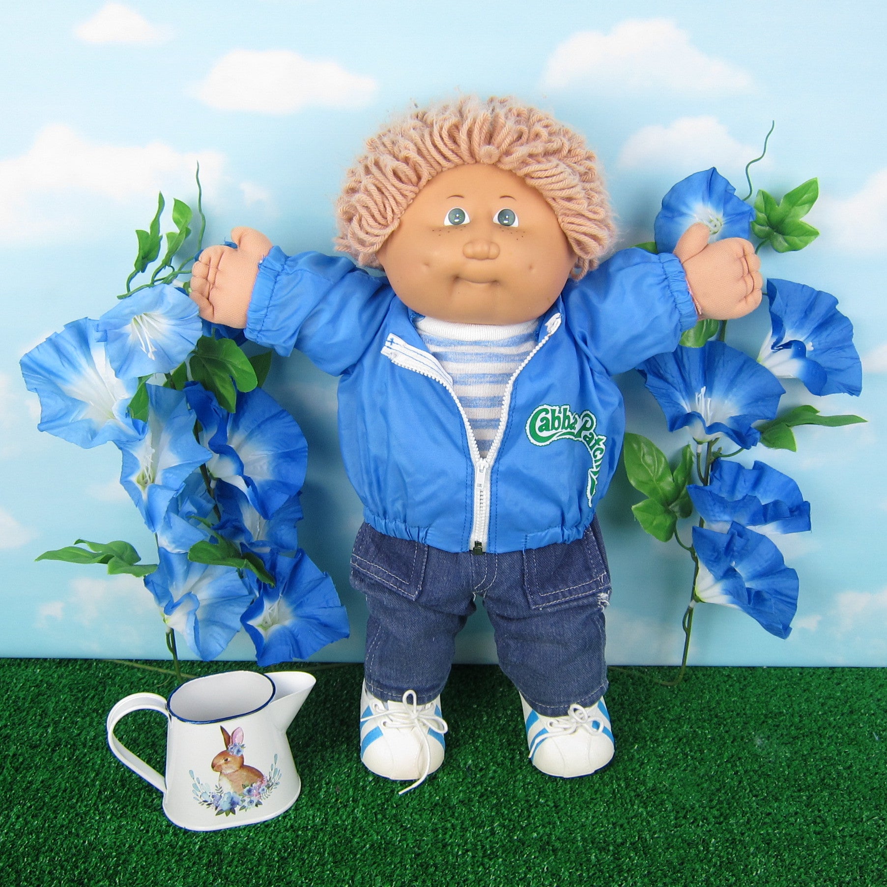 Cabbage Patch Kids boy doll with light brown hair, green eyes, freckles and dimples