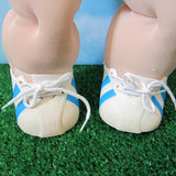 Cabbage Patch Kids doll shoes with blue stripes
