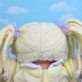 Cabbage Patch Kids girl doll with braided pigtails