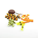Miniature wrapped hard candies, chocolates, candy corn
