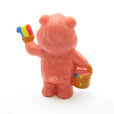 Cheer Bear painting a colorful rainbow Care Bears figurine