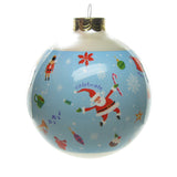 Glass ball Hallmark ornament with Santa, nutracker, poinsettia, Christmas pudding, mug of hot cocoa, horn, ornament, and star