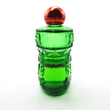 Avon Christmas Surprise Charisma cologne green stocking bottle