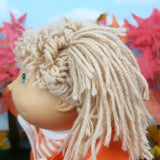 Cabbage Patch Kids with cut yarn hair