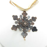 Copper snowflake necklace with large metal pendant
