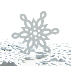 White scalloped snowflake paper punches