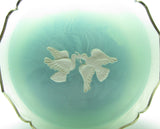 Vintage Avon Rapture powder container with doves