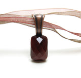 Red tiger's eye necklace on brown organdy ribbon