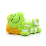 Frappe Frog Sleeping on pillow
