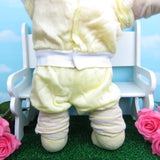 Cabbage Patch Kids girl doll with yellow sweatshirt and pants