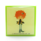 Green plastic gift box with Meadow Morn necklace