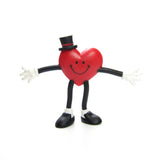 Valentine's Day heart pin with bendy arms and legs