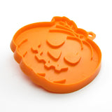 Orange plastic jack-o-lantern cookie cutter