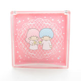 Kiki and Lala on clear lid of trinket box