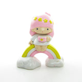 Little Twin Stars figurine with Lala sitting on a rainbow