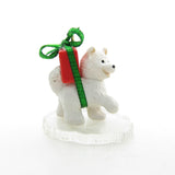 White husky miniature ornament with red package and green bow