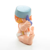 Magic Diaper Babies toy with saucepan on head