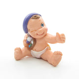 Magic Diaper Babies miniature figurine with purple beret and artist paint palette