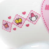 Flower, butterfly, and tea pot on My Melody rice bowl