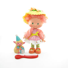 Peach Blush Strawberry Shortcake doll with Melonie Belle pet