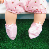 Pink baby doll booties with white bow