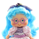 Close-up of Plum Puddin Berrykin doll's face