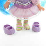 Plum Puddin Berrykin doll with purple stains on tights