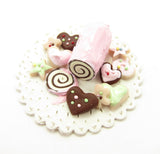 Pink Swiss Roll and Frosted Cutout Cookies